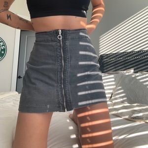 High waisted denim zip up skirt.